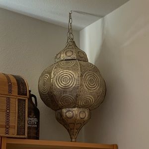 Vintage inspired faux brass gold toned Moroccan style ceiling hanging lantern